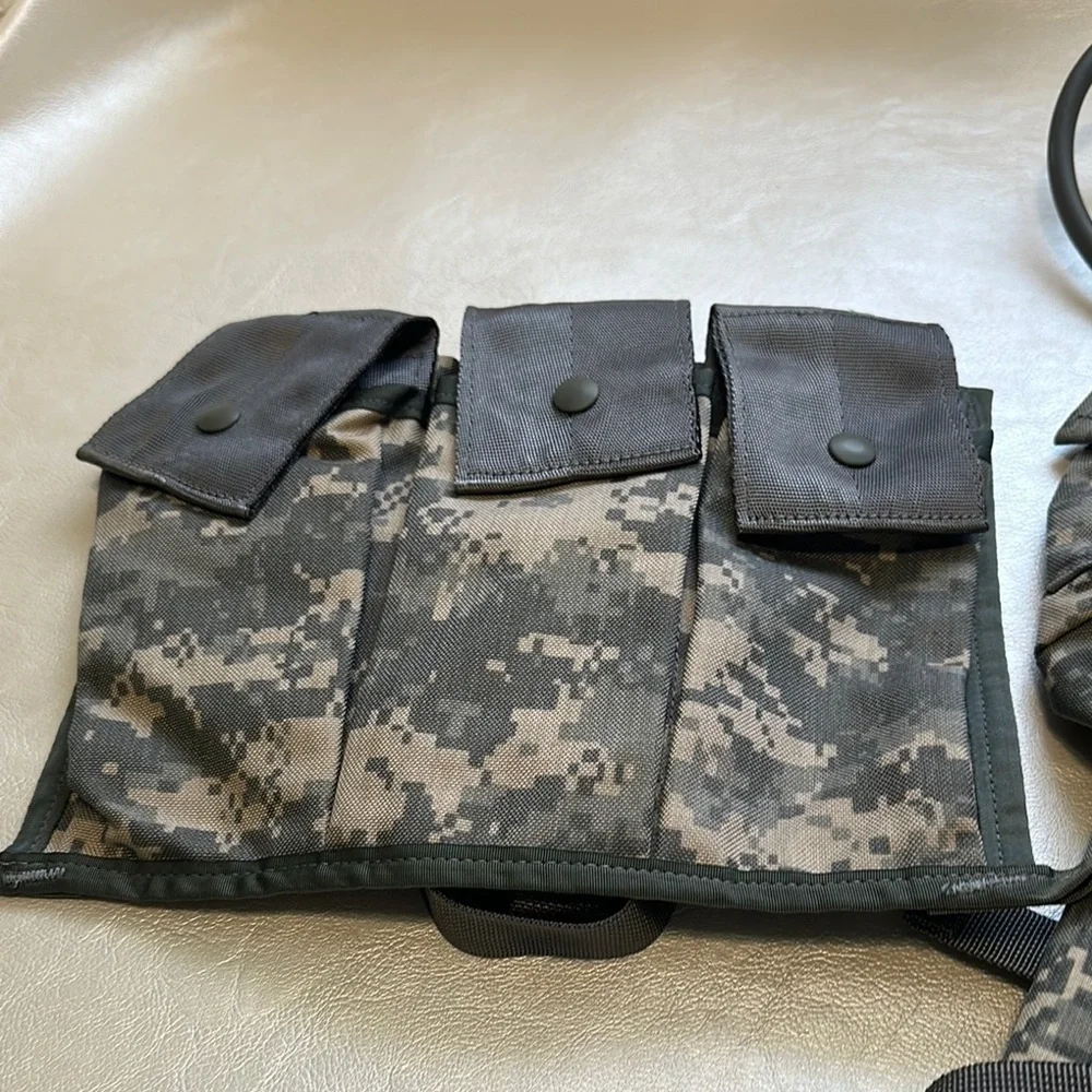 Gray and Black Tactical Backpack with MOLLE System